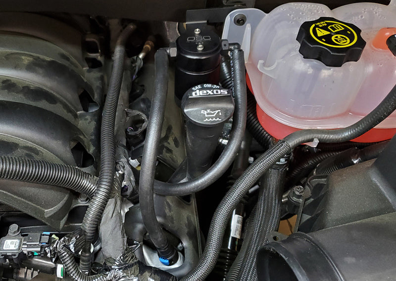 J&amp;L 2019-23 Chevrolet Silverado/GMC Sierra 1500 5.3L V8 Driver Side Oil Separator 3.0 - Black Anod